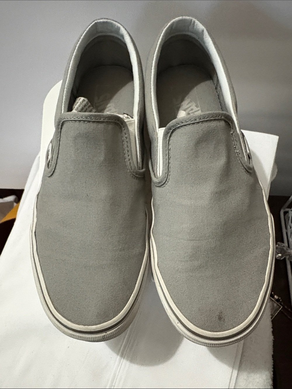 Vans Classic Slip-On Canvas Sneakers in Light Gray